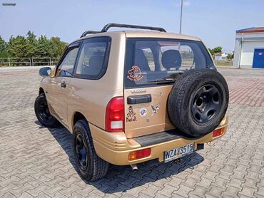 Suzuki: Suzuki Grand Vitara: 1.5 l. | 2001 έ. 150000 km. SUV/4x4 — 5