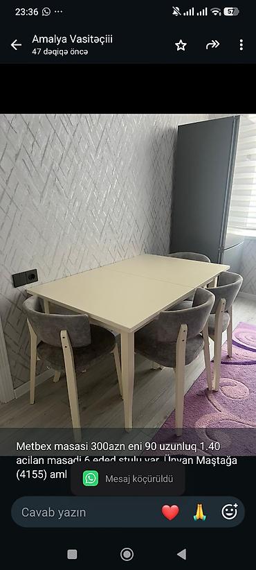 Metbex masasi 300azn eni 90 uzunluq 1.40 acilan masadi 6 eded stulu