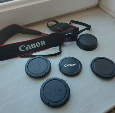 canon video kamera: Kamera ve linza qapaglari. ve Orginal Canon kemeri kemer 10 azn