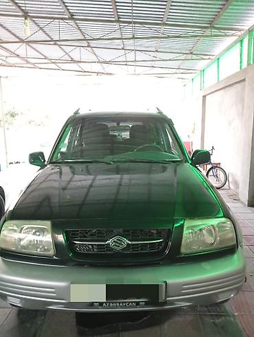 Suzuki: Suzuki Grand Vitara: 2.5 л | 1999 г. 260000 км Внедорожник — 1