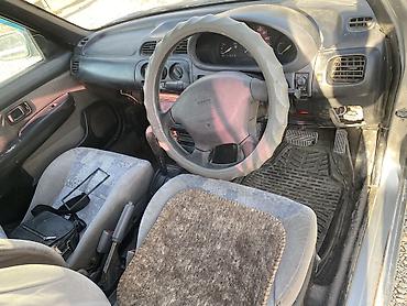 бартавой сапог: Nissan March: 2000 г., 1.3 л, Автомат, Бензин, Универсал — 5