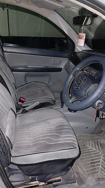 bud e9: Mazda Demio: 2003 г., 1.3 л, Автомат, Бензин, Хэтчбэк — 6