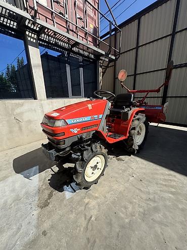 реверс: Мини-трактор Yanmar Ke-3 с почвофрезой 14 л/с - Компактный колесный — 2