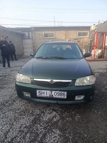 селгоз техника: Mazda 323: 2000 г., 1.5 л, Механика, Бензин, Хэтчбэк