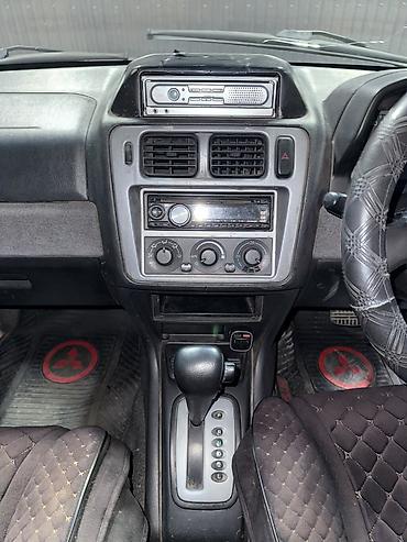 мото зонтик: Mitsubishi Pajero iO: 2002 г., 2 л, Автомат, Бензин, Кроссовер — 6