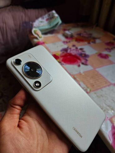 колонки рядом: Huawei Pura 70 Pro, 128 ГБ, цвет - Бежевый, 1 SIM, 2 SIM
