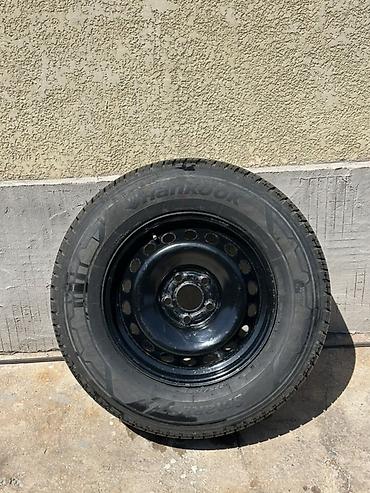 22570: Колесо в сборе: стальная штампованная дисковая часть + шина Hankook — 1