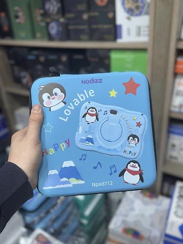 Digər planşetlər: Kids Nodizz NPad 712 planşeti cazibədar mavi korpusunda parlaq 7.85 — 1