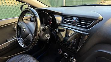 Продажа авто: Kia Rio: 2015 г., 1.4 л, Автомат, Бензин, Седан — 9