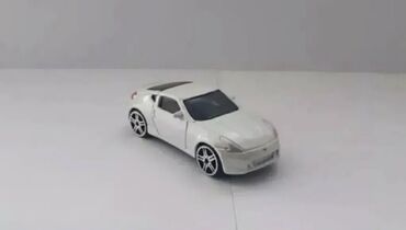 Oyuncaqlar: Təcili Satılır. Endirim Var. Nissan 370z Cupe modelka satılır.Ağ — 3