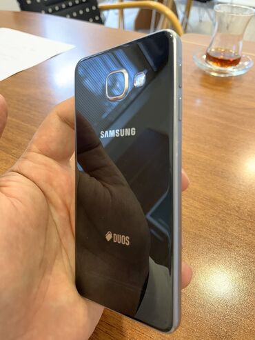 samsung a3 qiymeti 2016: Samsung Galaxy A3 2016, 16 GB, rəng - Boz, Düyməli, Sensor, İki sim kartlı
