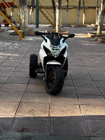 sup 400: Uşaq üçün elektrikli üçtəkərli motosiklet - Model: “New Youth 08” — 2