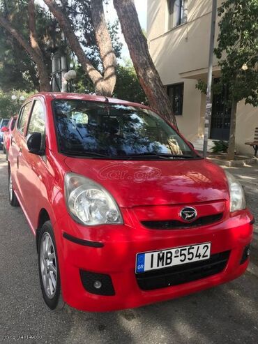 Daihatsu Cuore: 1 l | 2008 year | 124000 km. Hatchback