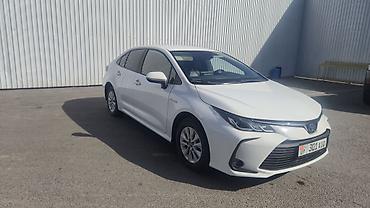 byd e5 2020: Toyota Corolla: 2021 г., 1.8 л, Вариатор, Гибрид, Седан — 2