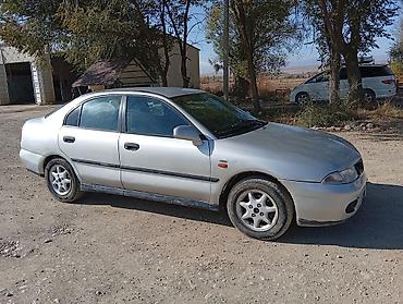 б4 80: Mitsubishi Carisma: 1998 г., 1.8 л, Механика, Бензин, Седан — 2