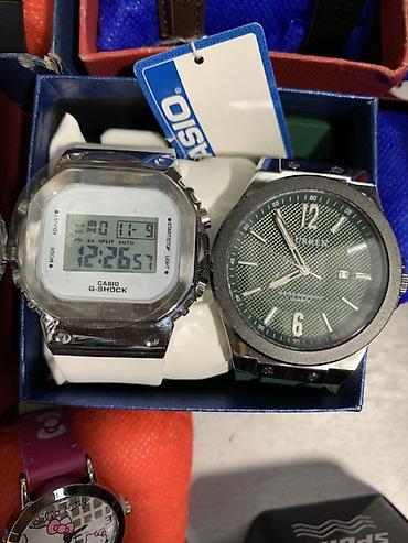 Набор из двух наручных часов. 1) Цифровые Casio G‑Shock: - Крупный