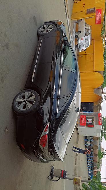 sonata hybrid: Hyundai Sonata Hybrid sedan - Rəng: qara, kuzovda xrom detallarla - — 2