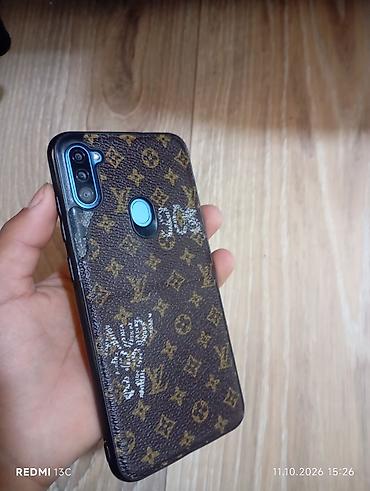 Мобильные телефоны: Смартфон Samsung Galaxy A11 (синий) с чехлом - Экран 6.4" Infinity-O — 4