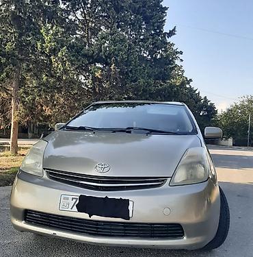 yem qıran: Toyota Prius: 1.5 l | 2007 il Sedan — 1