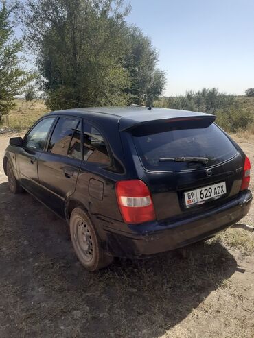 с связи с переездом: Mazda 323: 2000 г., 1.8 л, Механика, Бензин, Хэтчбэк