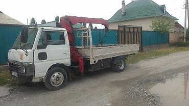 кран камаз: Манипулятор, Nissan, 1986 г., от 4 т — 4