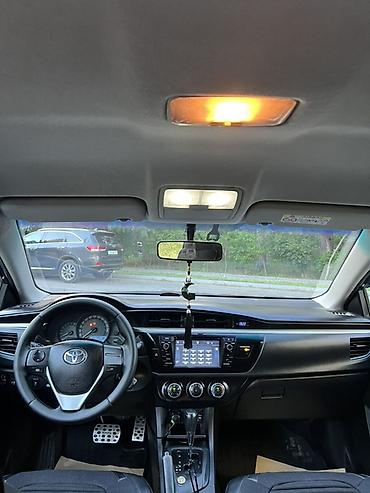 klas 6: Toyota Corolla: 1.6 l | 2014 il Sedan — 10