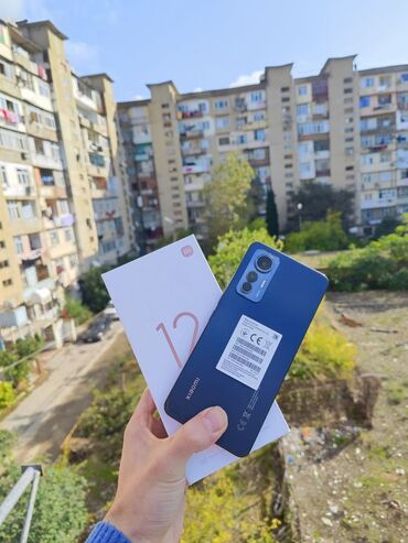 xiomi not 11pro: Xiaomi Mi 12 Lite, 128 ГБ, цвет - Черный, 
 Кнопочный, Отпечаток пальца