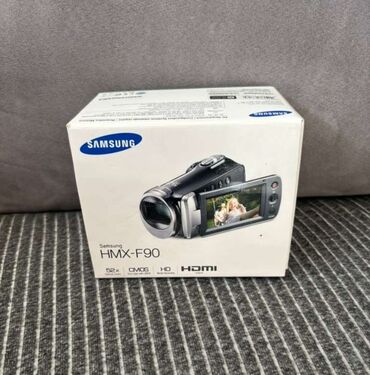 samsung a8 plus: Samsung videokamera . Yeni qutuda. full complect + yaddaş karti
