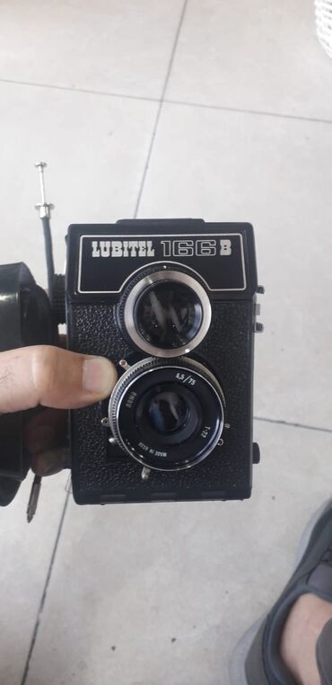 polaroid fotoaparat: Fotoaparat SSSR inin 1983 ilin fotoaparatidi tezedi qiymeti 100 azn