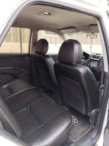 Kia: Kia Sportage: 0.2 l | 2008 il Krossover — 8