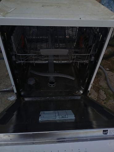 mətbəx texnikası: Hotpoint markalı qabyuyan maşın. Sərbəst dayanan, ağ rəngli modeldir — 2