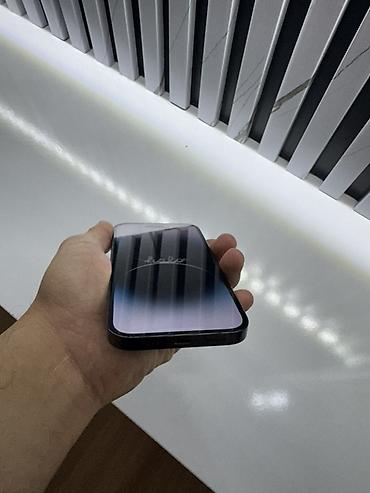 Apple iPhone: IPhone 14 Pro, Qara — 11