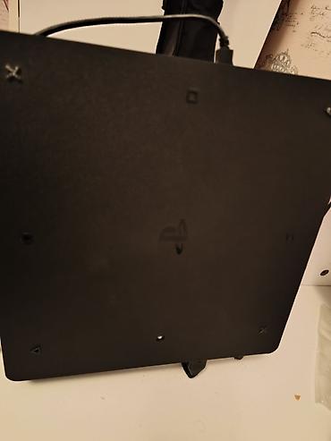 playstation 6: PlayStation 4 Slim oyun konsolu, proşıvkasız. PS4 Slim konsolu — 7