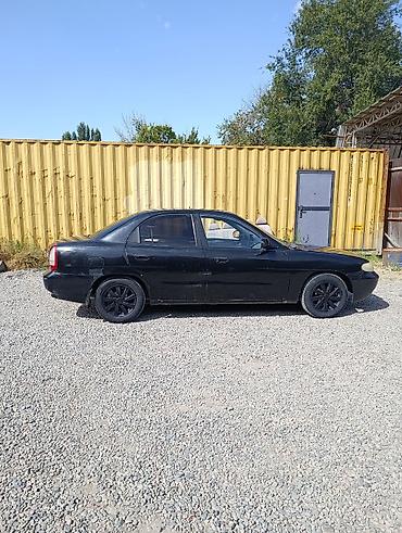 пинин ио: Daewoo Nubira: 1997 г., 1.5 л, Механика, Бензин, Седан — 1