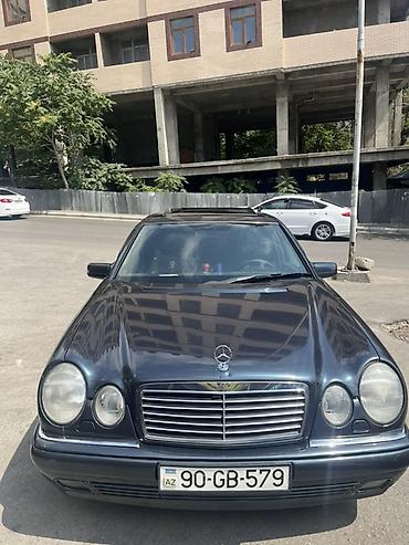 Mercedes-Benz: Mercedes-Benz E-Class: 3.2 l | 1995 il Sedan — 3