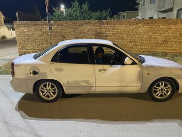 Daewoo: Daewoo Nubira: 1999 г., 1.5 л, Механика, Бензин, Седан