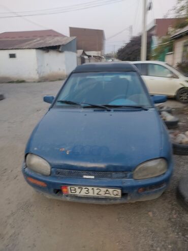 маленький мопед для детей: Mazda 121: 1991 г., 1.3 л, Механика, Бензин, Седан