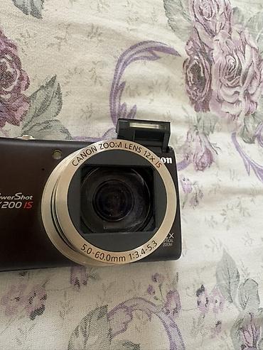на аккумуляторе: Canon PowerShot SX200 IS — старая винтажная камера все работает без — 9