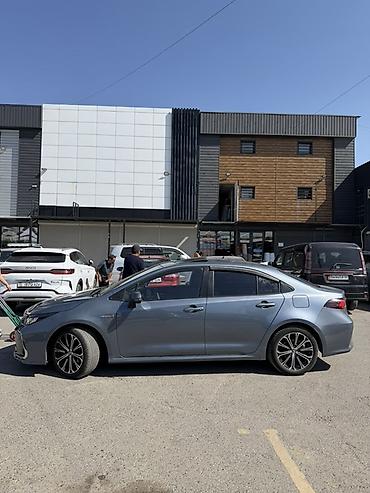 geely e5: Toyota Corolla: 2023 г., 1.8 л, Автомат, Гибрид, Седан — 3