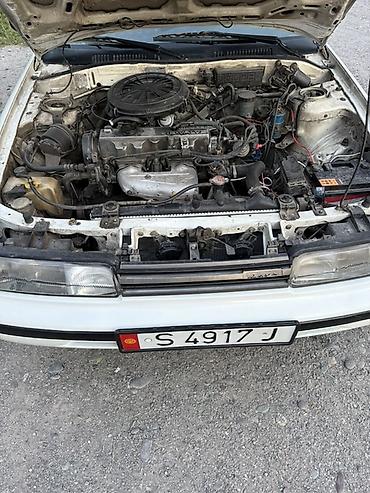 Транспорт: Mazda 626: 1989 г., 2.2 л, Механика, Бензин, Купе — 10