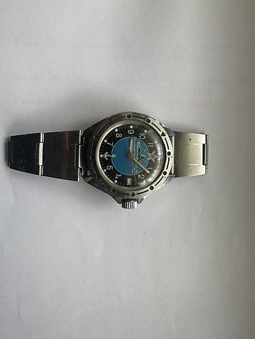 vostok: Məhsul: Mexaniki qol saatı (çelik korpus və qolbaq) Xüsusiyyətlər: - — 1