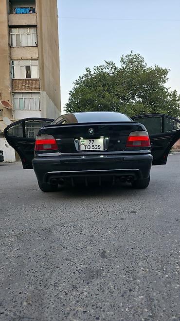 bmw e39 lip: BMW 5 Series E39 sedan – qara rəng, M‑paket üslublu eksteryer — 2