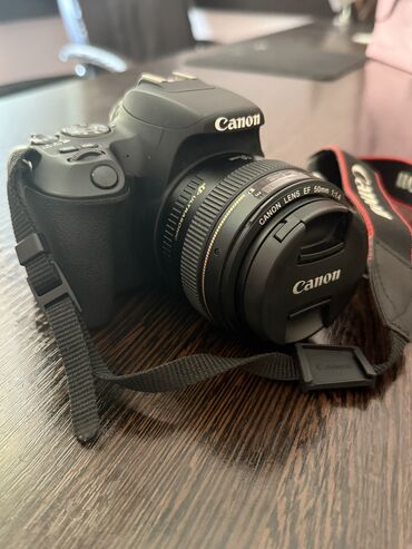 куплю морозилку б у: Canon EOS 200 D 2020il
 Lens 50mm 1.4 
 Lens 18-50 mm