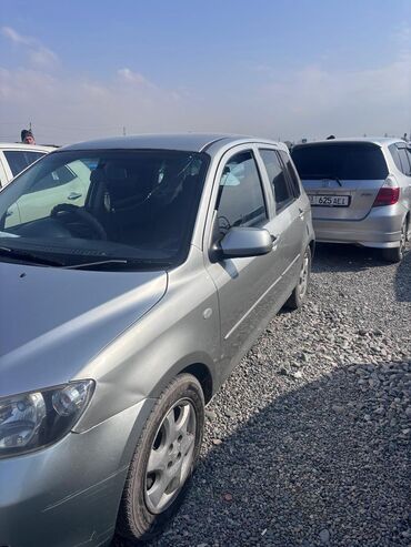Mazda: Mazda Demio: 2005 г., 1.4 л, Автомат, Бензин, Седан