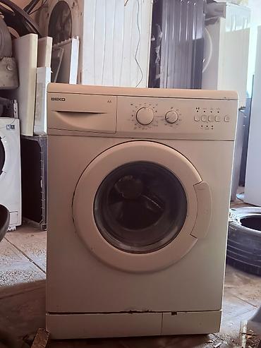 Paltaryuyan maşınlar: Beko önyükləməli paltaryuyan maşın - Enerji sinfi: AA - Ön hissədə — 1