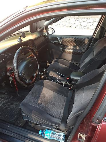 opel ehtiyat hisələri: Opel Vectra sedan – vişnə rəngi, 4 qapı, qara disklər, tonlu şüşələr — 9