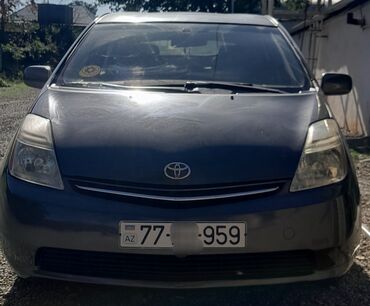 bunu ���������� bu ������������ 2 4: Toyota Prius (2-ci nəsil) hibrid hetçbek Xüsusiyyətlər: - Hibrid