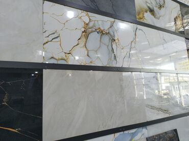 tamet metlax: Mərmər effektli, düzbucaqlı formalı keramik plitələr. Müxtəlif rəng və