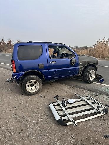 аваринные машины: Suzuki Jimny: 2000 г., 0.7 л, Автомат, Бензин, Внедорожник — 3