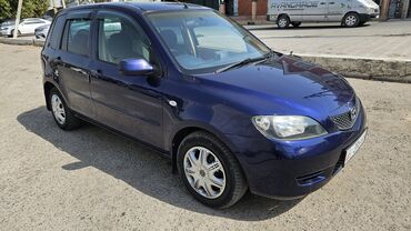 обмен машинами с доплатой: Mazda Demio: 2003 г., 1.3 л, Автомат, Бензин